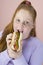 Teenage Girl Eating Hotdog