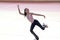 Teenage girl in elegant figure skating routine