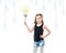 Teenage girl holding bright shiny lightbulb