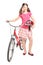 Teenage girl holding a helmet and pushing a bike