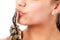 Teenage girl kissing pet python