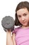 Teenage girl lifting weight