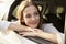 Teenage Girl Looking Out Of Car Window On Family Road Trip