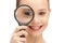 Teenage girl with magnifying glass