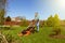 Teenage girl mowing grass