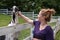 Teenage girl pets a goat