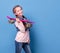 Teenage girl with pink skateboard