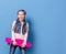 Teenage girl with pink skateboard