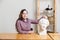 Teenage girl   with   plaster head of   young man