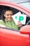 Teenage Girl Recently Passed Driving Test Holding P Plates