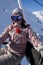 Teenage girl riding chair lift at ski resort