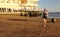 Teenage girl runs on beach in Tenerife, Spain