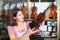 Teenage girl selecting classical violin