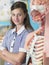 Teenage Girl Standing By Anatomical Model