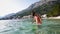 Teenage girl standing in the sea with mask and snorkel