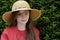 Teenage girl with straw hat