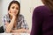 Teenage Girl Suffering From Depression Visiting Counsellor