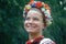 A teenage girl in traditional Slavic costume