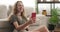 Teenage girl video chatting using mobile phone