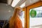 Teenage girl wearing face mask inside for the train. Sydney trains transport NSW during Covid-19 pandemic. Mandatory face masks in