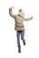 A teenage girl in winter clothes joyfully jumps. Dressed in jeans, boots, a warm jacket and hat. Isolated over white background.