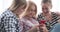 Teenage girls browsing social media content on smartphone