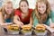 Teenage Girls Eating Burgers