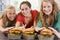 Teenage Girls Eating Burgers