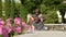 Teenage girls playing the guitar in the park. Girl play solo guitar in green nature park
