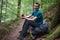 Teenage hiker having a break