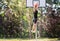 Teenage jumping and dunking basketball