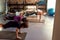 Teenage kids doing exercises on mat using fitness straps in gym with female trainer. Sport, healthy lifestyle, physical