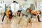 Teenage krump dancer dancing with teenagers in choreographic studio