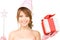Teenage party girl with magic wand and gift box