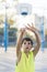 Teenage playing basketball on an outdoors court