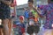 Teenage plays water with his friends during Songkran