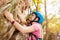 Teenage rock climber exercising outdoors in forest