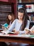 Teenage Schoolgirl Studying In Library