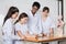 Teenage Schoolgirls With Teacher Analyzing Stones