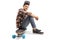 Teenage skater boy sitting on a longboard