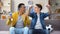 Teenage soccer fans cheering for national football team at home blowing vuvuzela