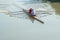 Teenage sportsmen in a boat, rowing on the river Rioni, Poti, Ge