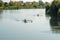 Teenage sportsmen in a boat, rowing on the river Rioni, Poti, Ge