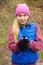 Teenage sporty girl listening to music outdoor.