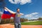 Teenage sprinter waving flag of Russian Federation