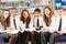 Teenage Students In Library Reading Books