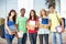 Teenage Students Standing Outside College Building