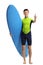 Teenage surfer with a surfboard making a thumb up gesture