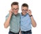 Teenage twin brothers with glasses on white