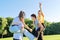 Teenage youth having fun in the park, happy laughing friends.